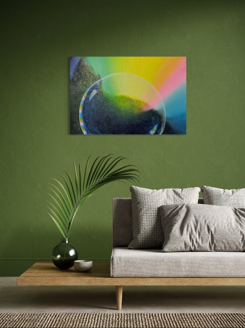Abstract painting of a crystal ball with rainbow colors on a green wall above a sofa.