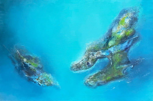 Two islands with green vegetation on a blue water background